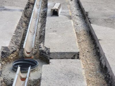 Excavation and installation of new drainage system (1) London