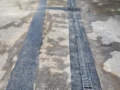 Excavation and installation of new drainage system (3) London