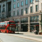 Red London bus parked in Mayfair, London